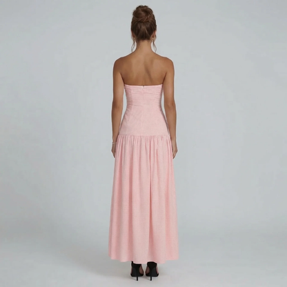 Black gingham strapless maxi dress — front view with relaxed drop-waist design.