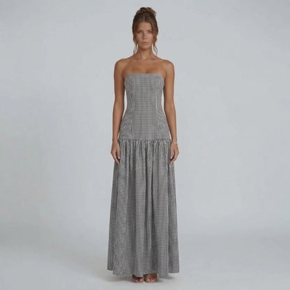 Pink gingham strapless maxi dress — back view showing zipper closure and clean strapless silhouette.