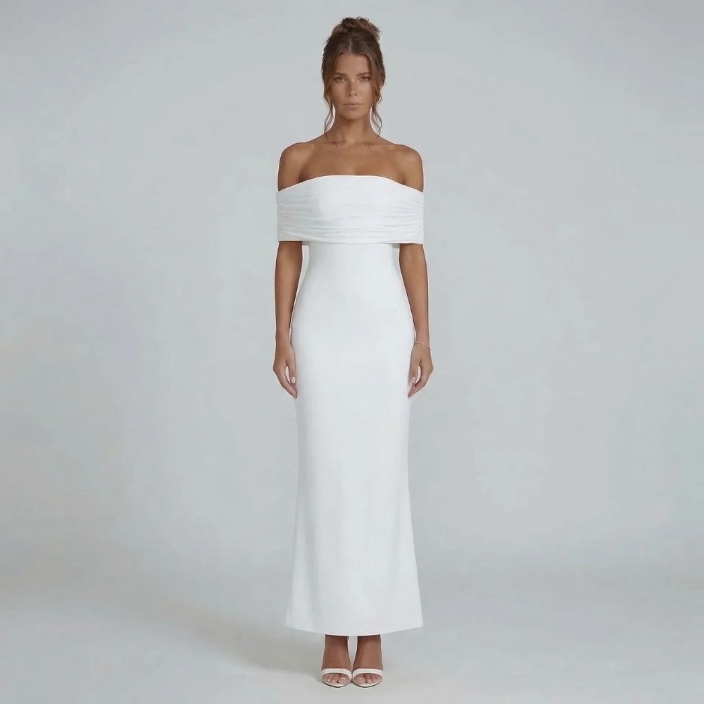 White off-shoulder ruched maxi dress with dramatic open back — front view highlighting sculpted silhouette.