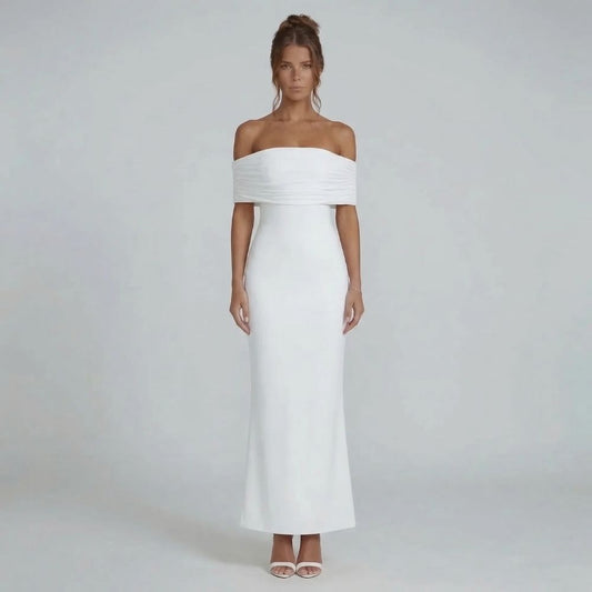 White off-shoulder ruched maxi dress with dramatic open back — front view highlighting sculpted silhouette.