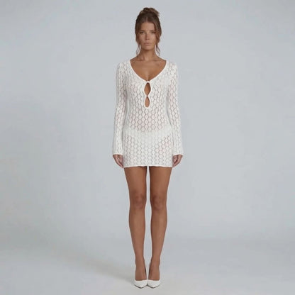 White crochet mini dress with V-neckline and bell sleeves — front view.