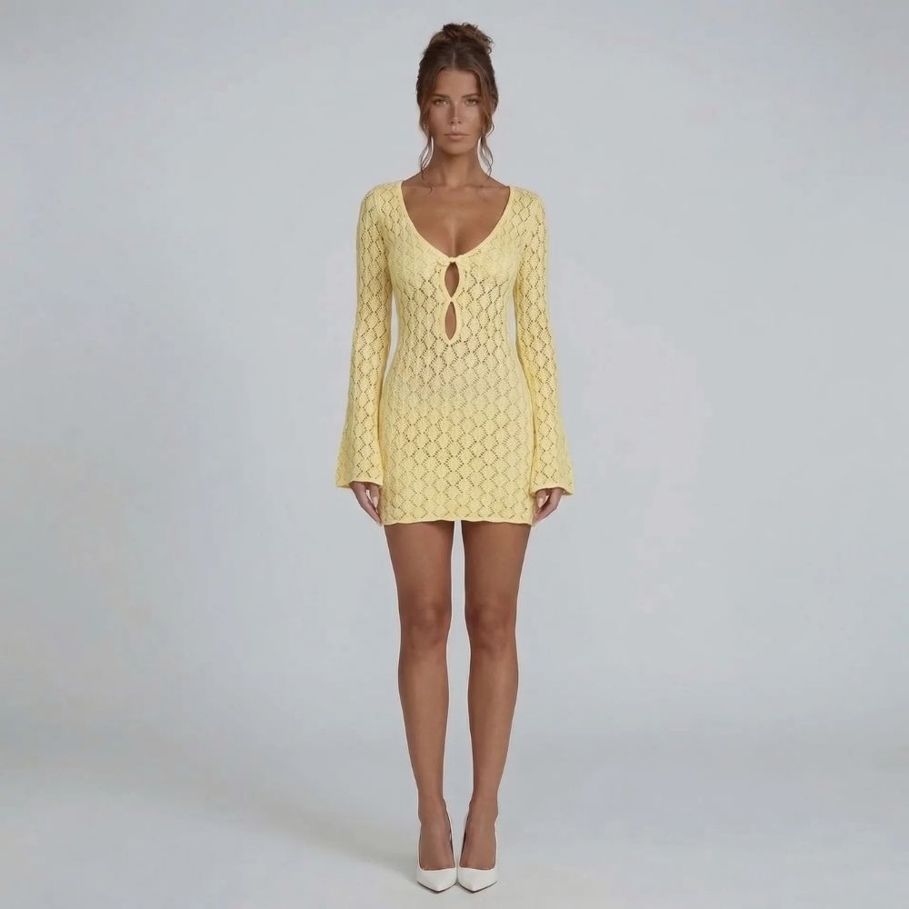 Yellow crochet mini dress with V-neckline and keyhole detail — front view.