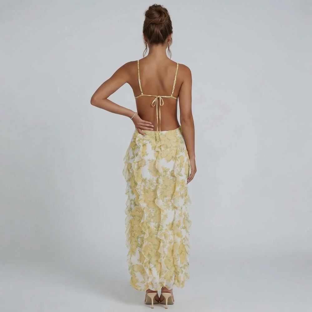 Yellow floral maxi dress with open back and tie closure — back view