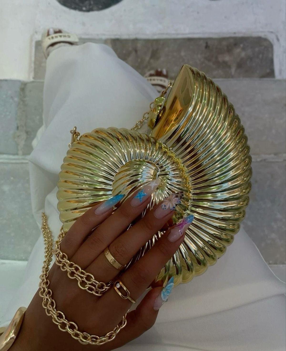 Liv Shell-Shaped Metallic Clutch in Gold