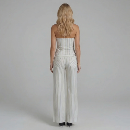 White striped wide-leg pants set — back view showing zipper closure and tailored fit.