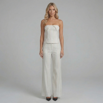 White striped wide-leg pants set with strapless corset-style top — worn front view.