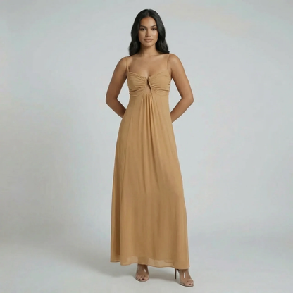 Tan ruched keyhole maxi dress with spaghetti straps — front view on model.