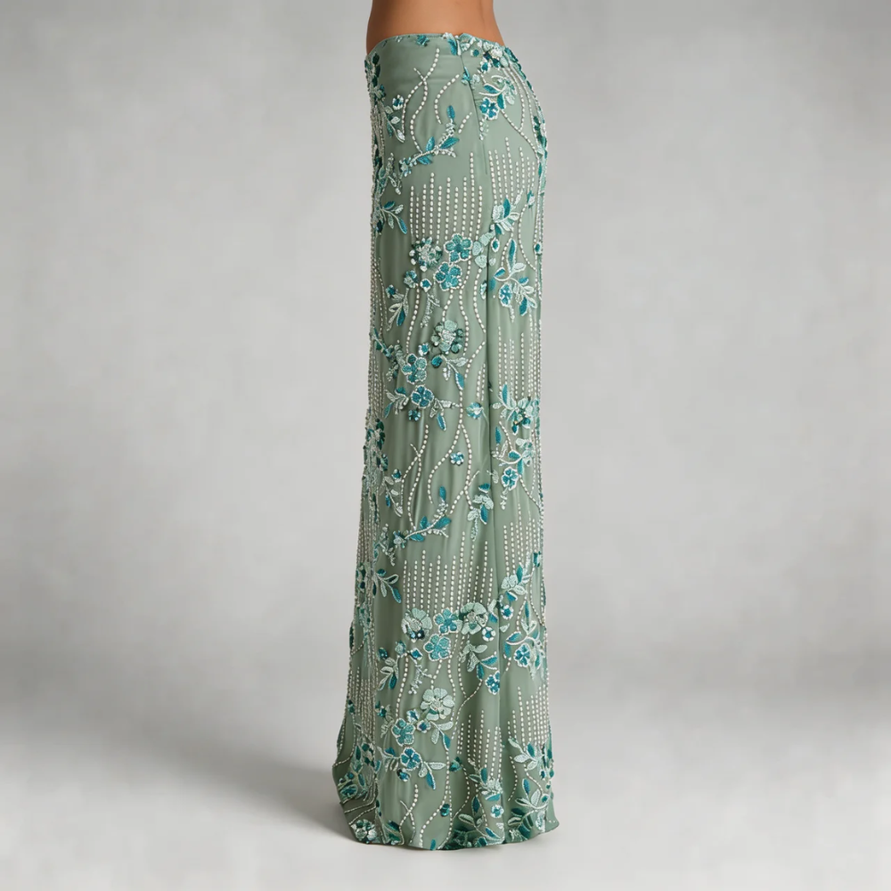 Mint floral sequin maxi skirt — side profile highlighting shimmer effect.