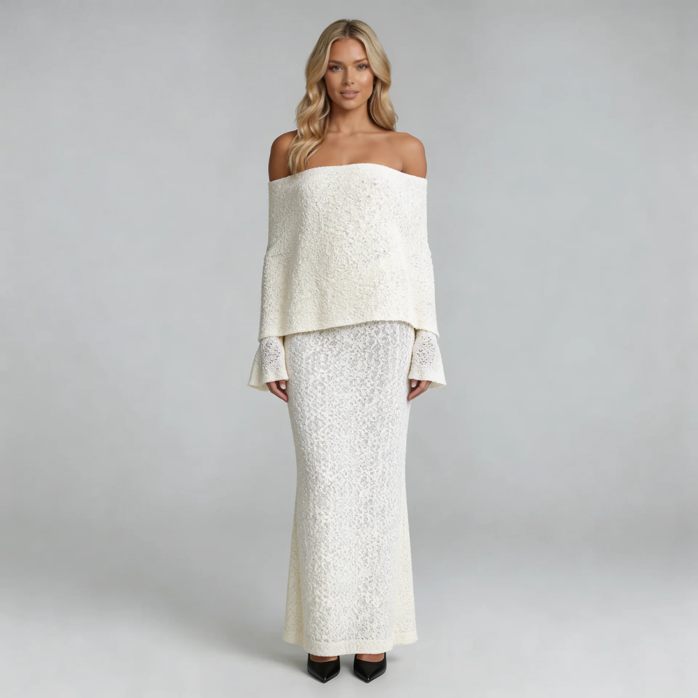 Ivory boucle off-shoulder maxi dress — front view showing flared sleeves and draped overlay.