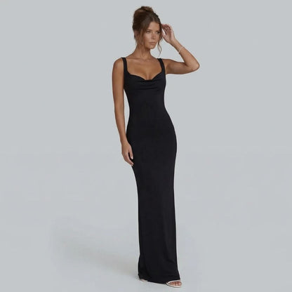 Black bow-back maxi dress with elegant draped neckline — styled look front view.