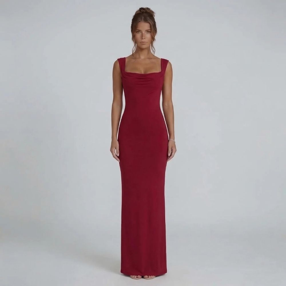 Red bow-back maxi dress featuring a draped neckline and curve-skimming silhouette — front view.