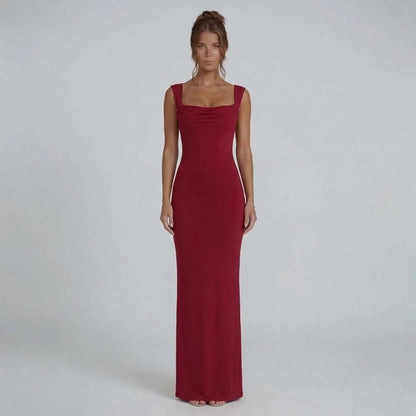 Red bow-back maxi dress featuring a draped neckline and curve-skimming silhouette — front view.