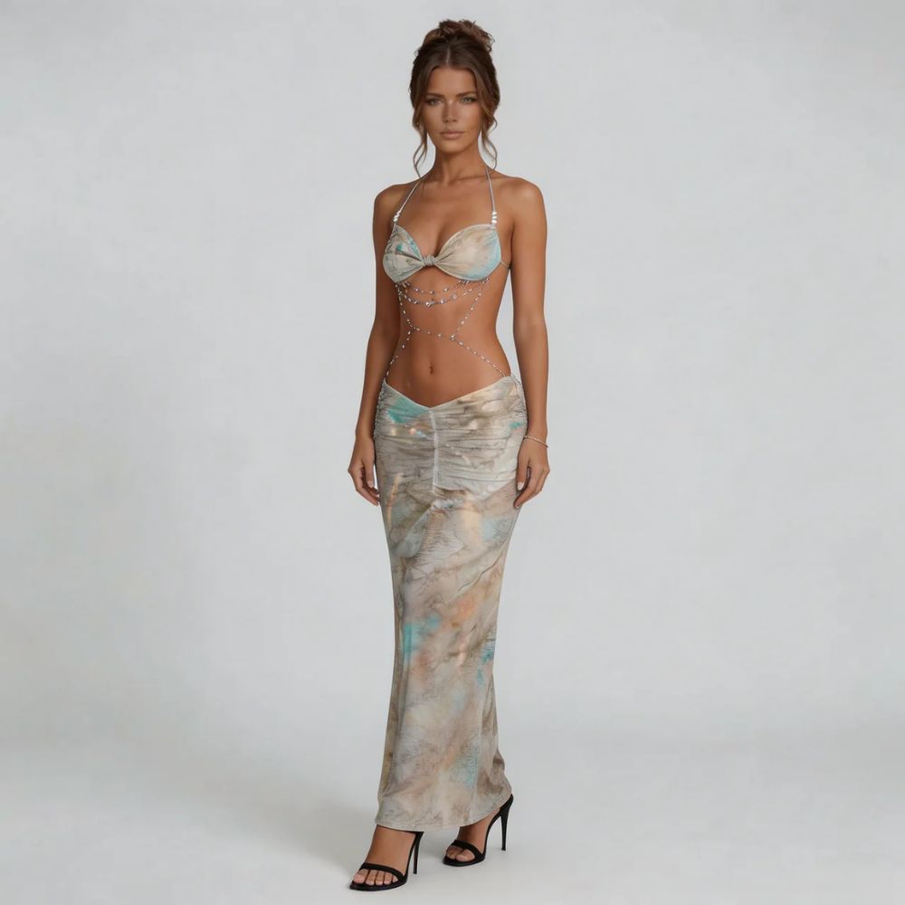Beige marble print maxi dress — side view showcasing ruched waist and draped body-chain detail.