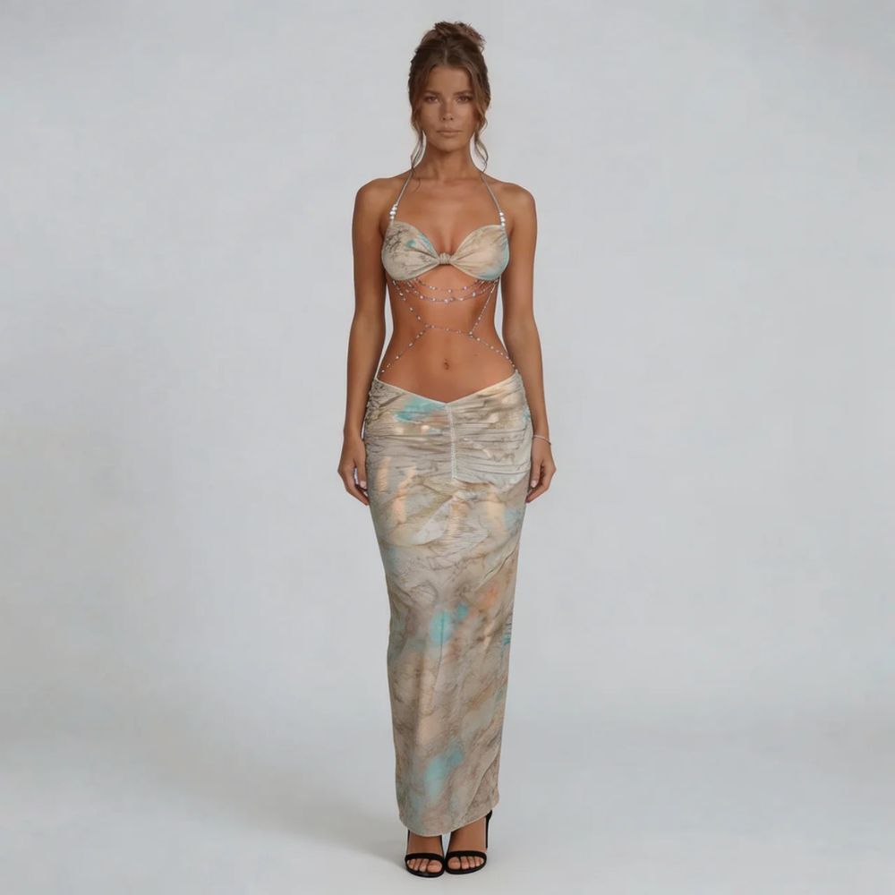 Beige marble print ruched maxi dress with halter neckline and body-chain accents — front view.