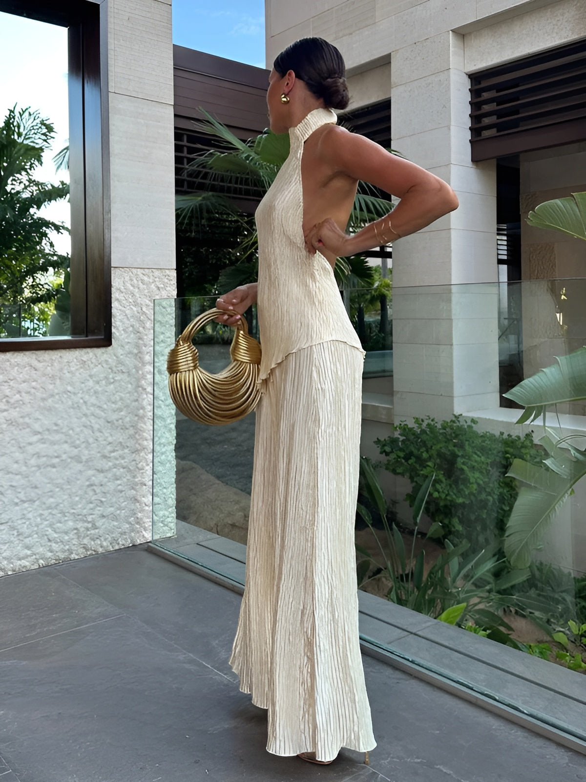 Women halter neck halter pleated jumpsuit, side view