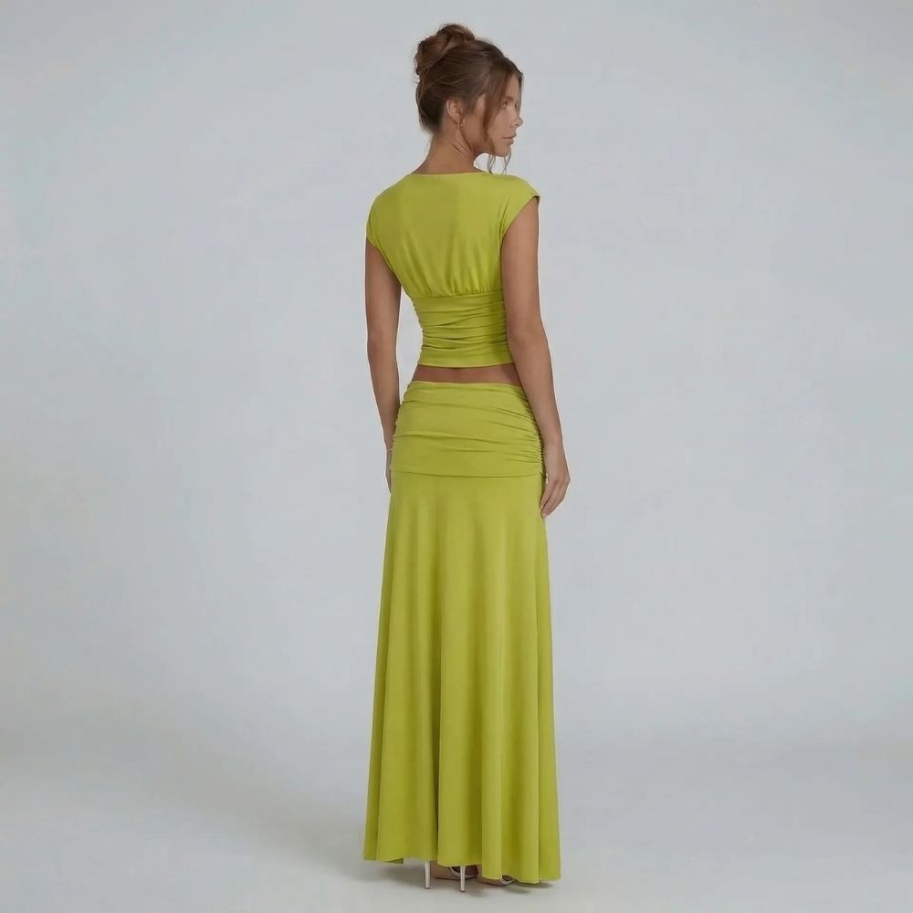 Lime green ruched maxi set — back view highlighting flowing skirt and ruched waist detail.