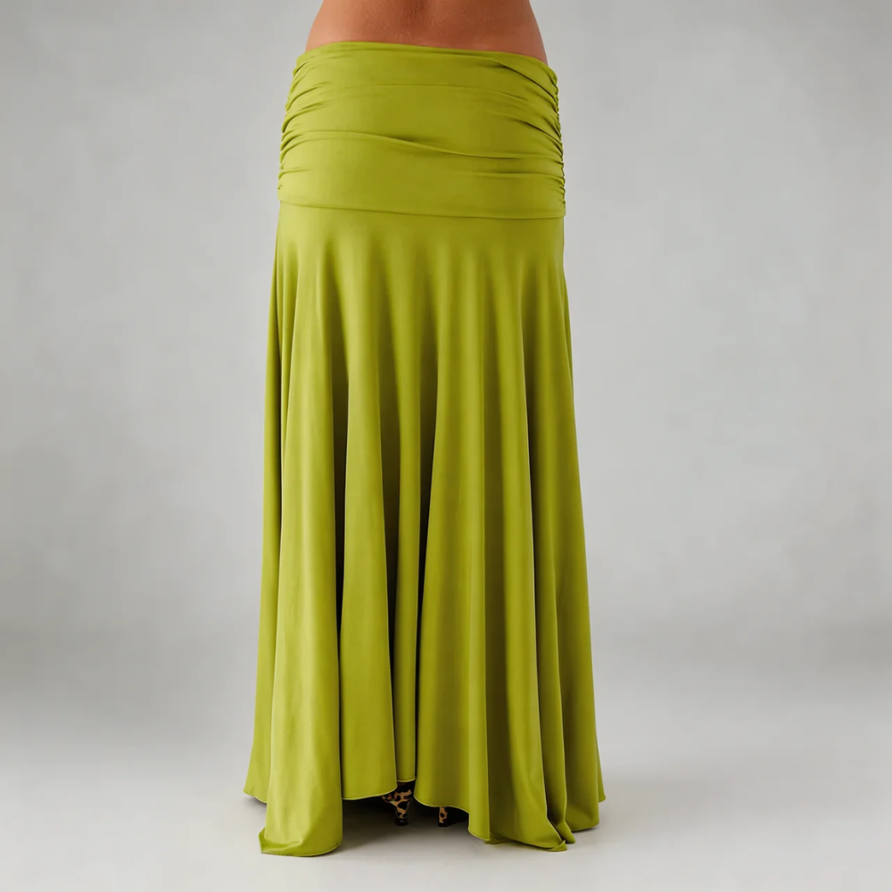 Lime green maxi skirt close-up — detailed view of ruched waistband and swishy hemline.