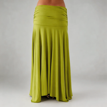 Lime green maxi skirt close-up — detailed view of ruched waistband and swishy hemline.