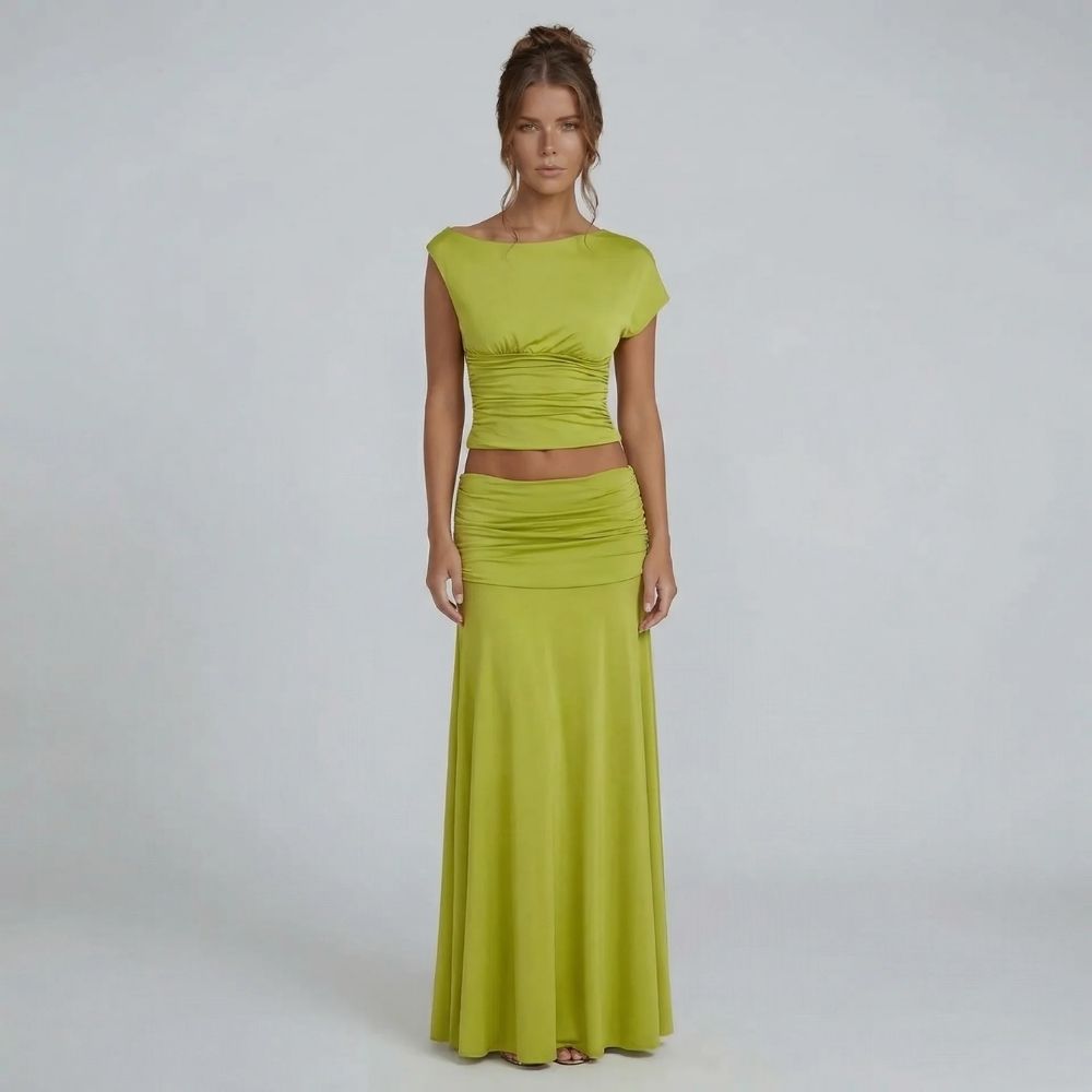 Lime green ruched maxi set with cap sleeve top — front view showcasing elegant boat neckline and floor-length skirt.