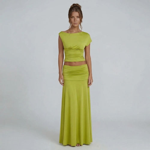 Lime green ruched maxi set with cap sleeve top — front view showcasing elegant boat neckline and floor-length skirt.