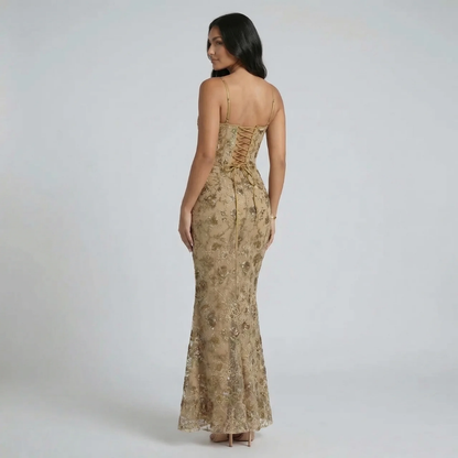 Beige floral lace corset maxi dress — back view detailing intricate lace-up design and full-length silhouette.