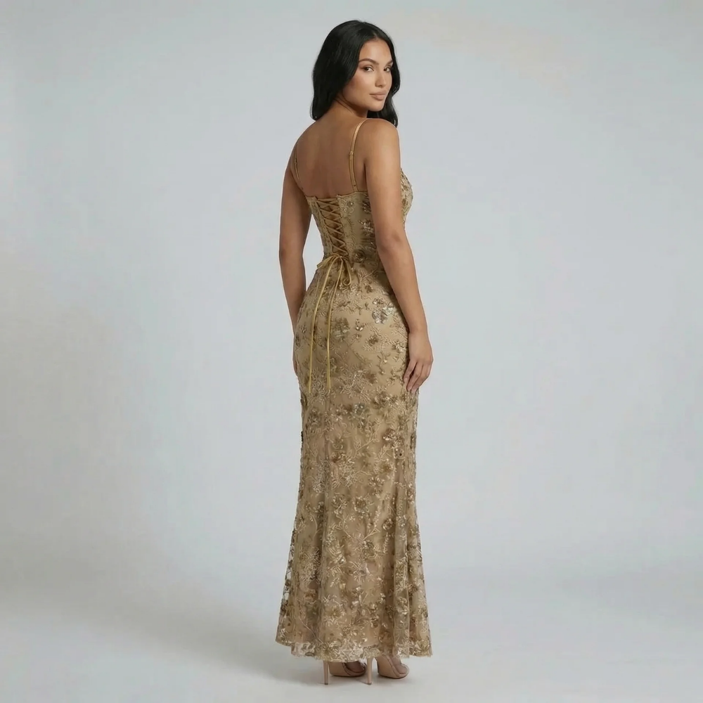 Beige floral lace corset maxi dress — side view highlighting delicate floral detail and elongated shape.