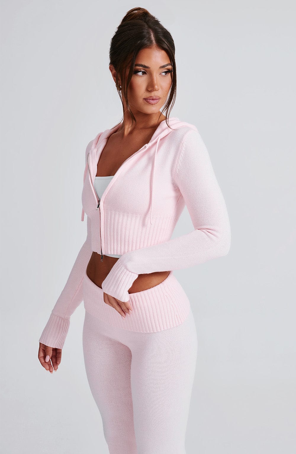 Women pink fitted set, detail close-up