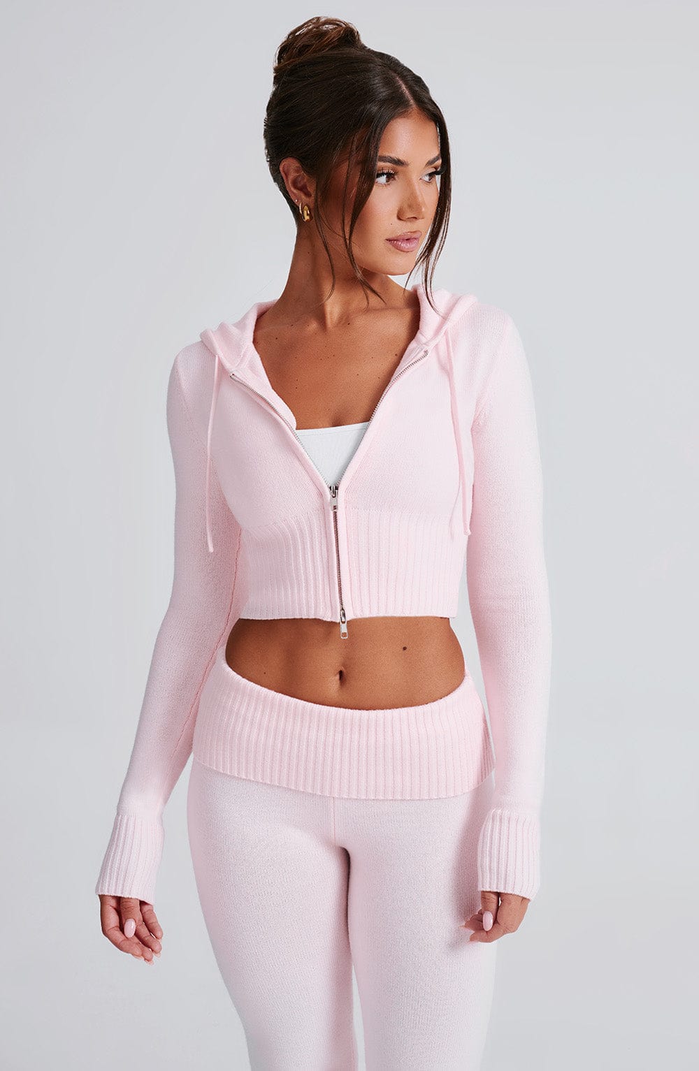 Women pink fitted set, detail close-up
