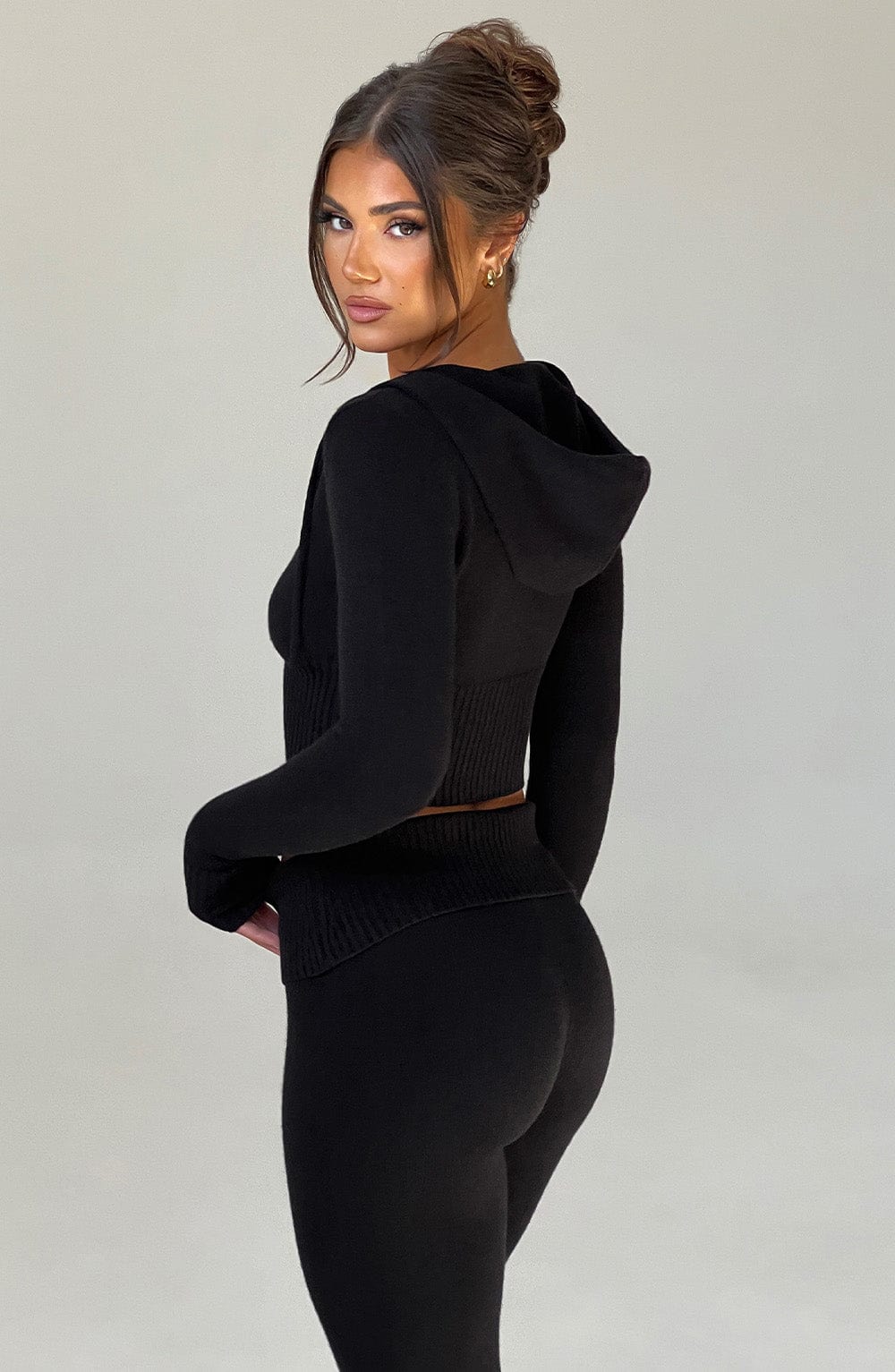 Women black fitted set, detail close-up