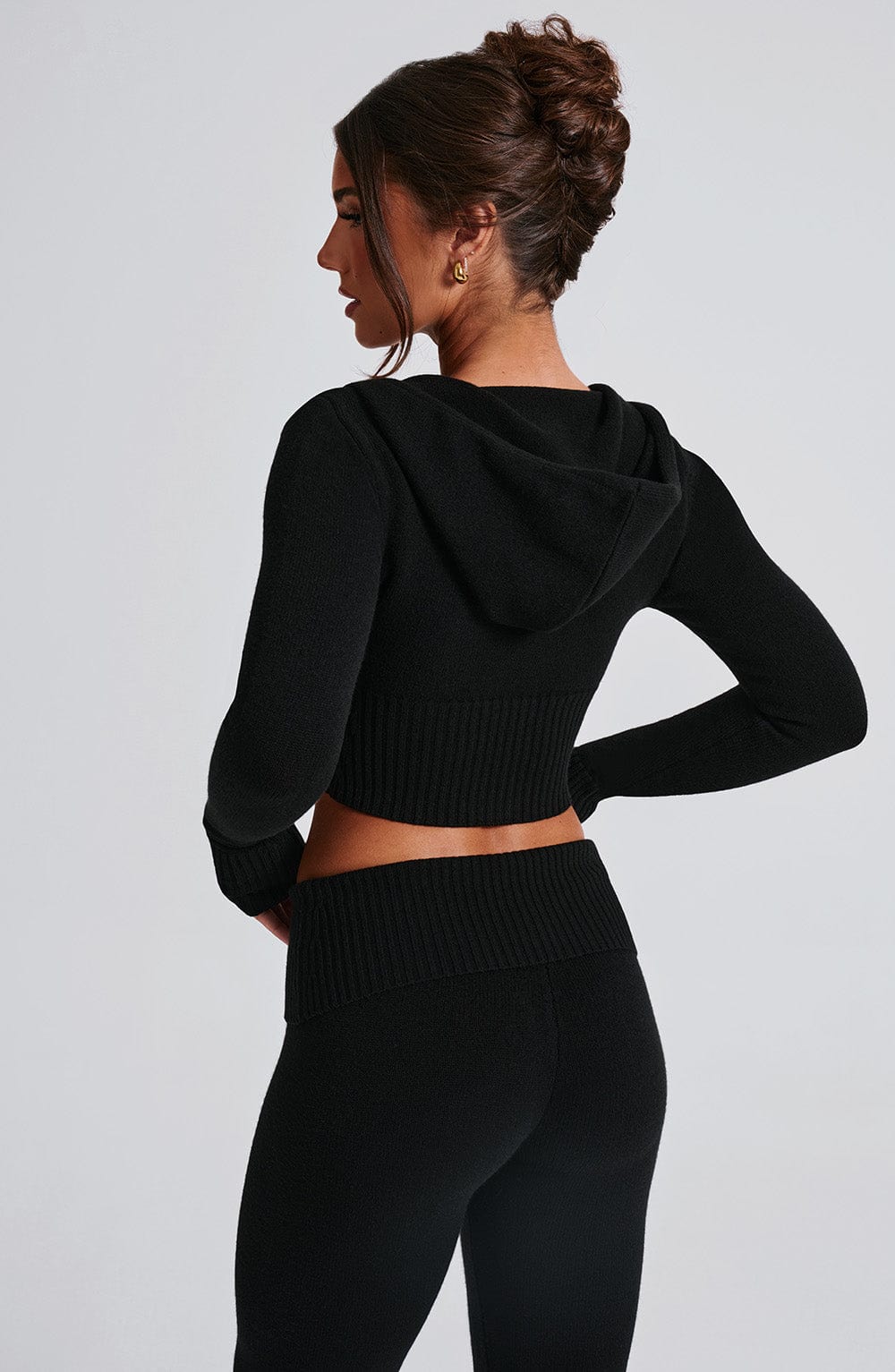Women black fitted set, detail close-up