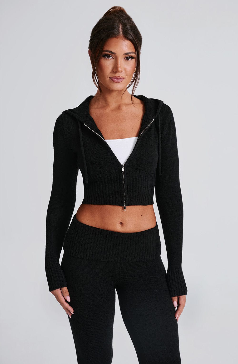 Women black fitted set, detail close-up