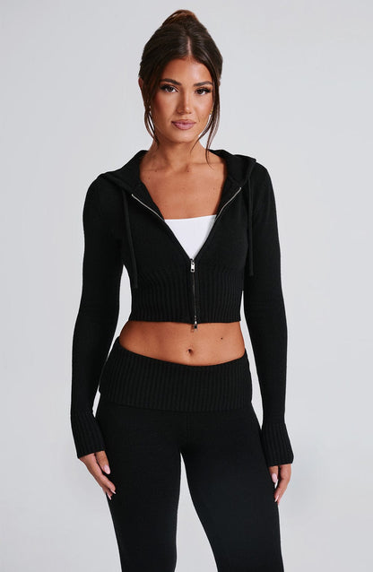 Women black fitted set, detail close-up