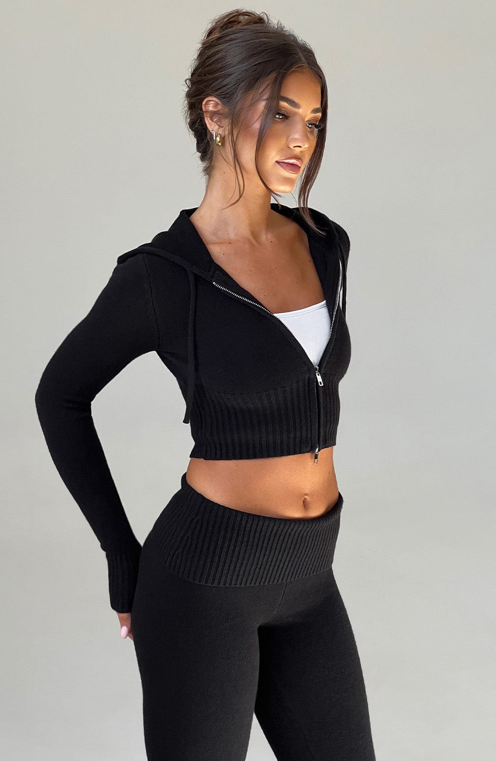 Women black fitted set, back view