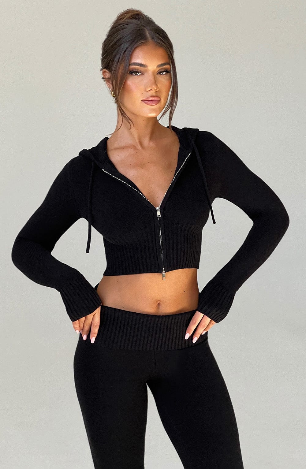Women black fitted set, back view