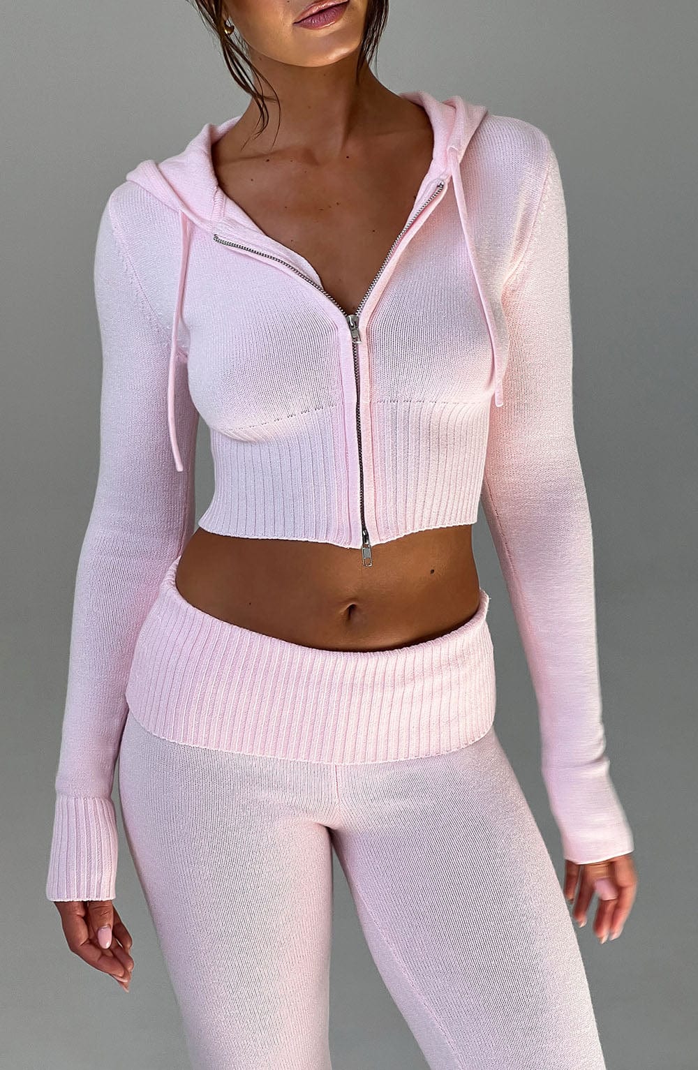 Women pink fitted set, back view