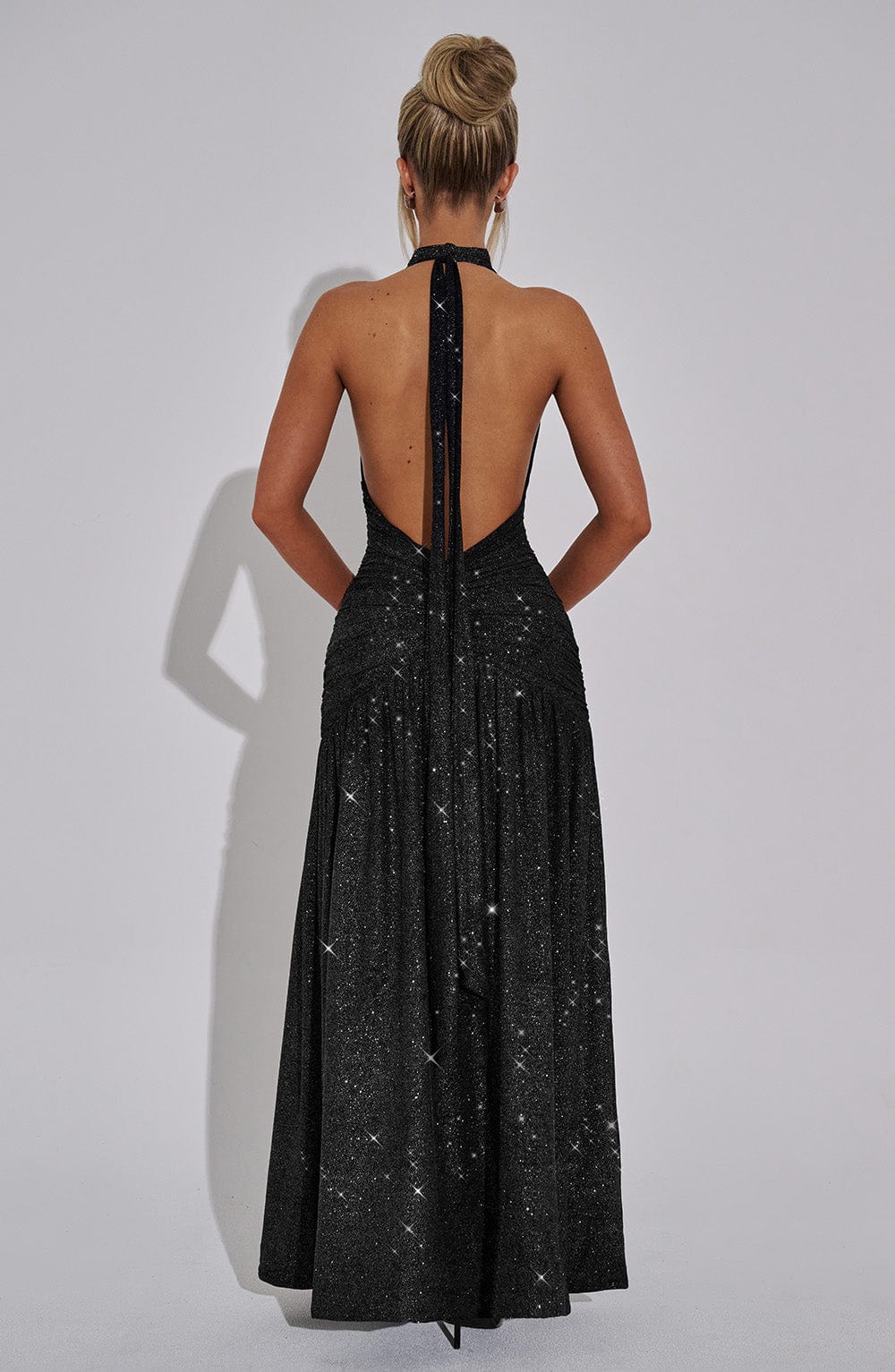 Women black halter maxi dress, back view