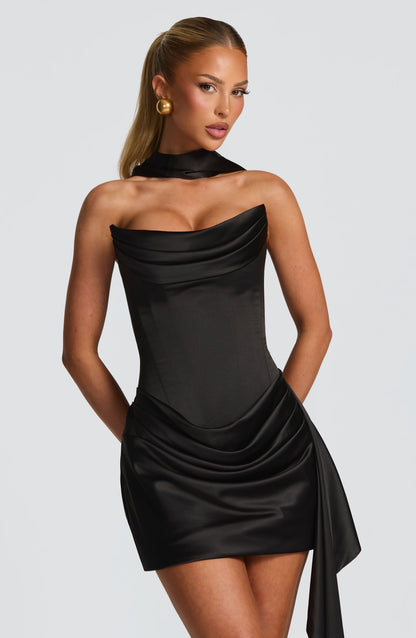 Women black cowl strapless mini dress, back view