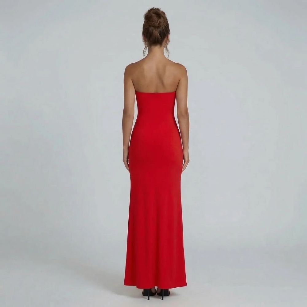 Red strapless maxi dress with floor-length hem and bandeau neckline — back view