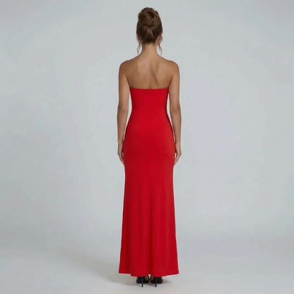 Red strapless maxi dress with floor-length hem and bandeau neckline — back view