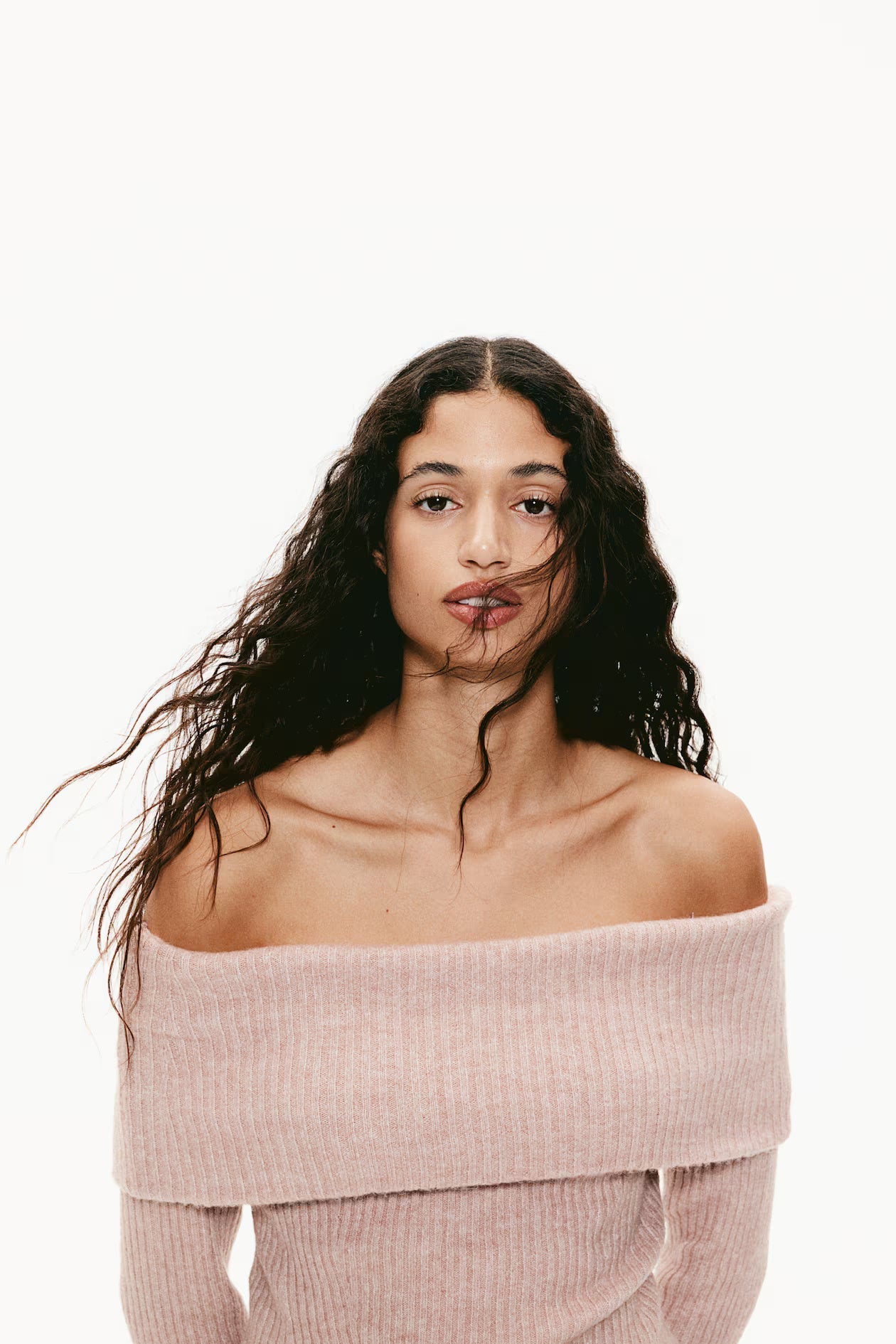 Women pink off-shoulder top, side view