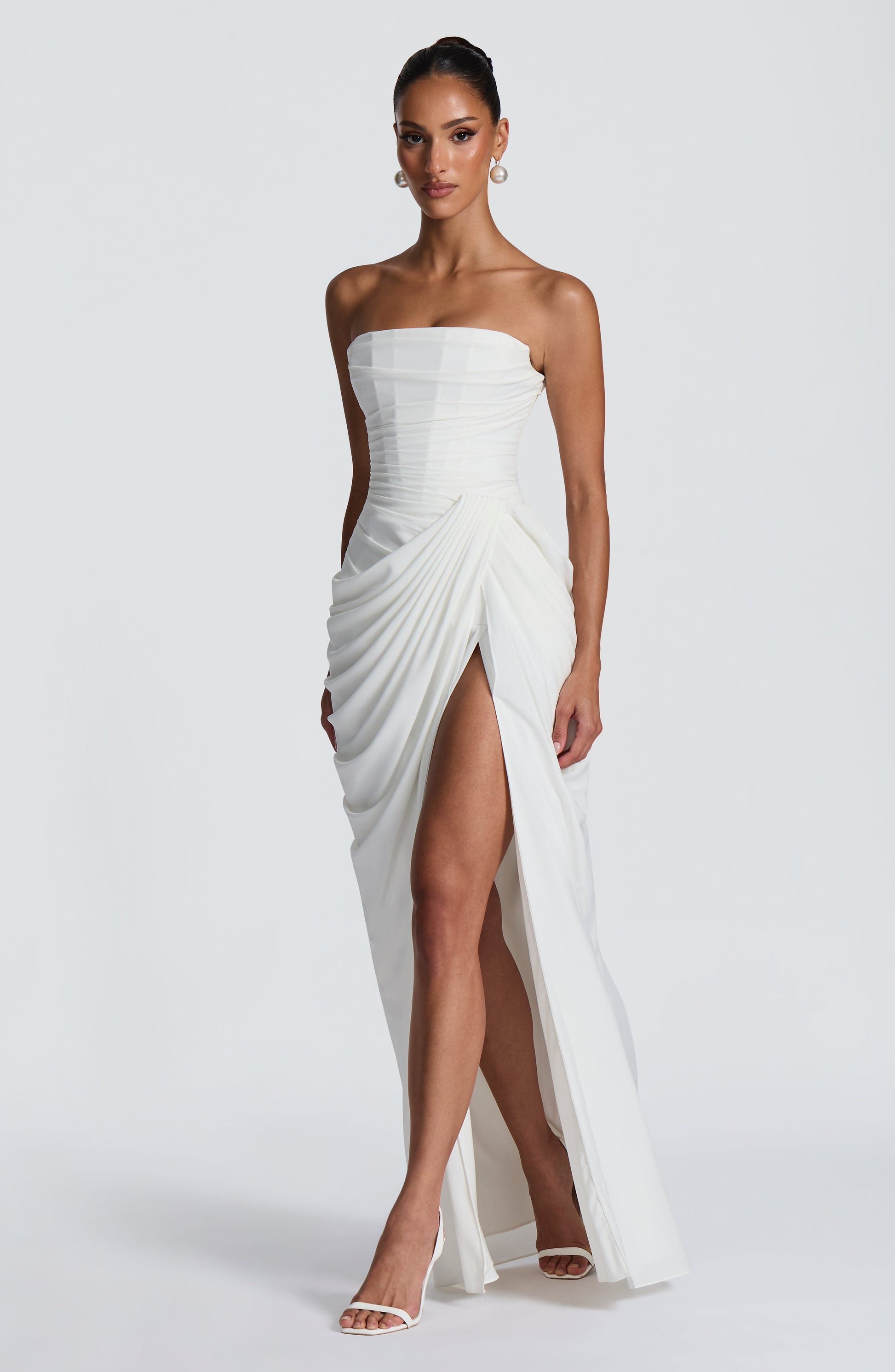 Women ivory strapless maxi dress, side view