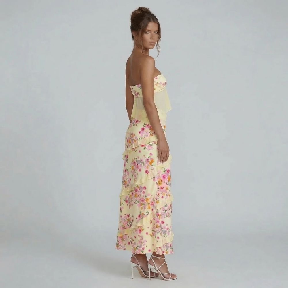 Ivory floral maxi set with tiered skirt — side view showing side slit and high-waisted design.