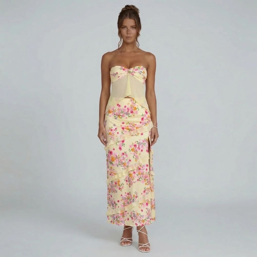 Ivory floral maxi set with bandeau top and tiered ruffle skirt — front view showing structured fit and flowing silhouette.