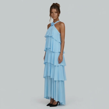 Side view of the light blue Rosalie ruffled maxi dress, highlighting the flowing tiered construction.