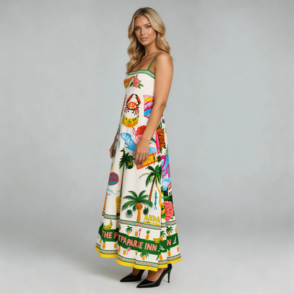 Cream tropical print maxi dress with adjustable straps — side view showing flowy silhouette.