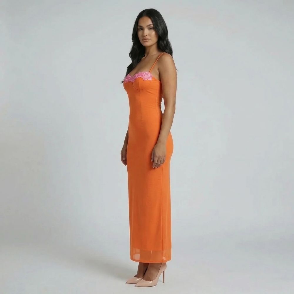 Orange mesh bustier maxi dress with lace trim — side view highlighting sculpted fit and supportive bustier bodice.