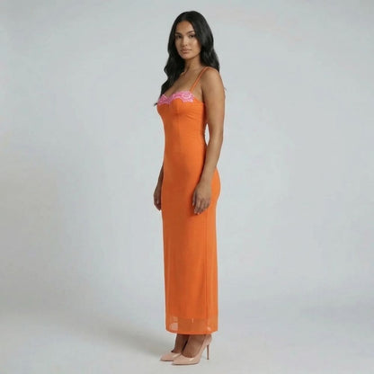 Orange mesh bustier maxi dress with lace trim — side view highlighting sculpted fit and supportive bustier bodice.
