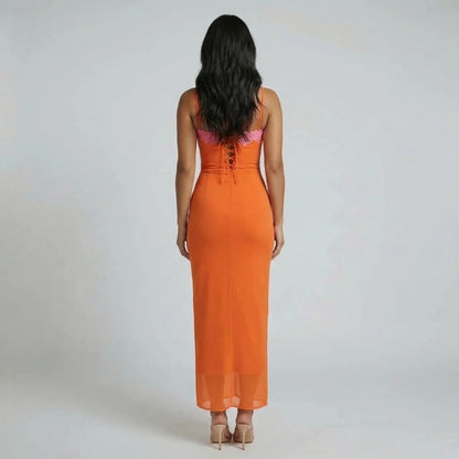 Orange mesh bustier maxi dress with lace trim — back view featuring lace-up detail and sheer mesh hem.
