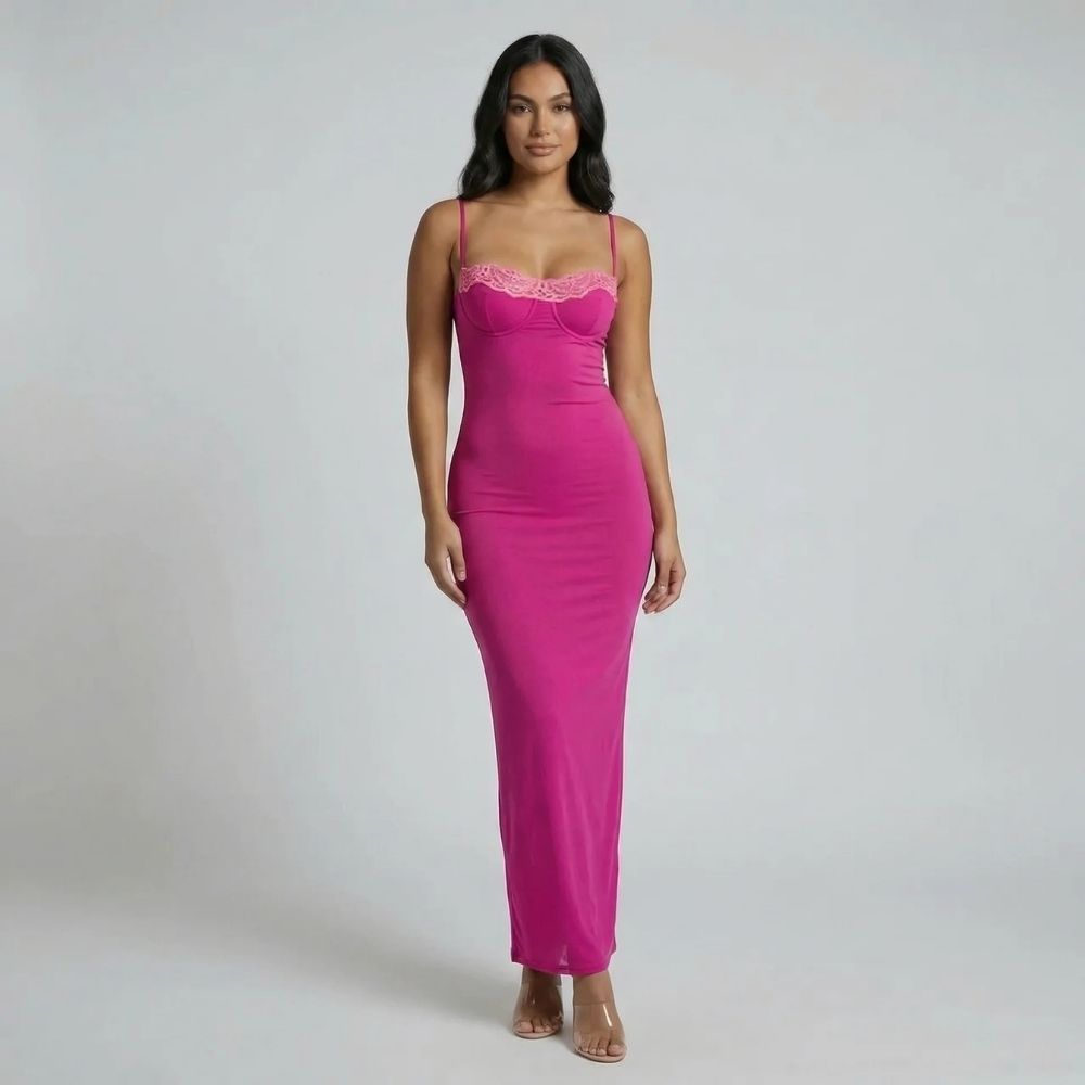 Pink mesh bustier maxi dress with lace trim — front view showcasing contrast lace neckline and curve-hugging fit.