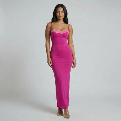 Pink mesh bustier maxi dress with lace trim — front view showcasing contrast lace neckline and curve-hugging fit.